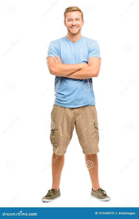 Attractive Young Man With Arms Folded On White Background Stock Photo