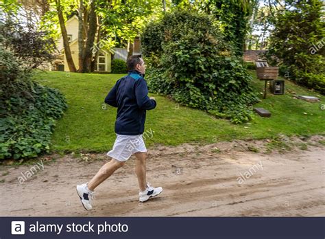 Male Athlete Walking After Running Outdoors Stock Photo Alamy