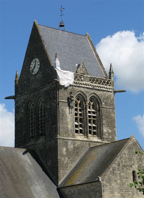 Church At Sainte Mere Eglise With Parachute Memorial