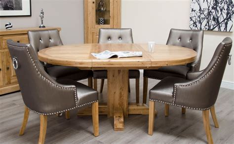 Dine in style with a round dining table in glass or wood from furniture village. Homestyle Deluxe Solid Oak Round Extending Dining Table ...