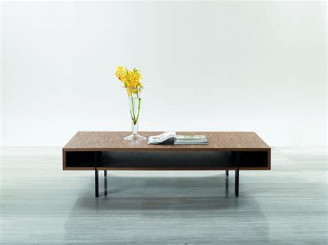 This rectangle coffee table is the answer to keeping communal space tidy, without sacrificing style. Stilt - Mid-Century Walnut Coffee Table