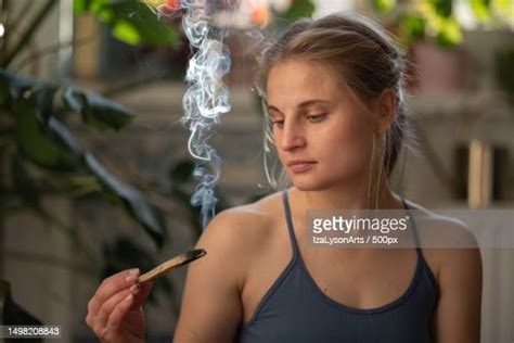 Young Woman Smoking Cigarette Close Up Photos And Premium High Res