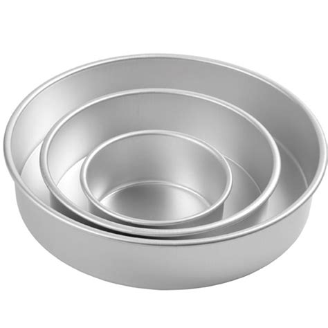 The handles are embossed with the pan's dimensions for quick reference and their larger size gives you a better grip when going in and out of the oven. Wilton Performance Round Pan Set, 3 Inch Deep