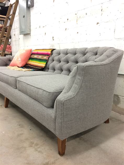 Before And After Vintage Tufted Sofa Goes From Skirted To Stunning