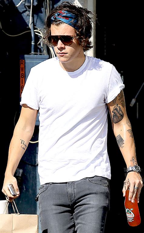 harry styles wears his heart on his sleeve literally —see the one direction singer s new tattoo