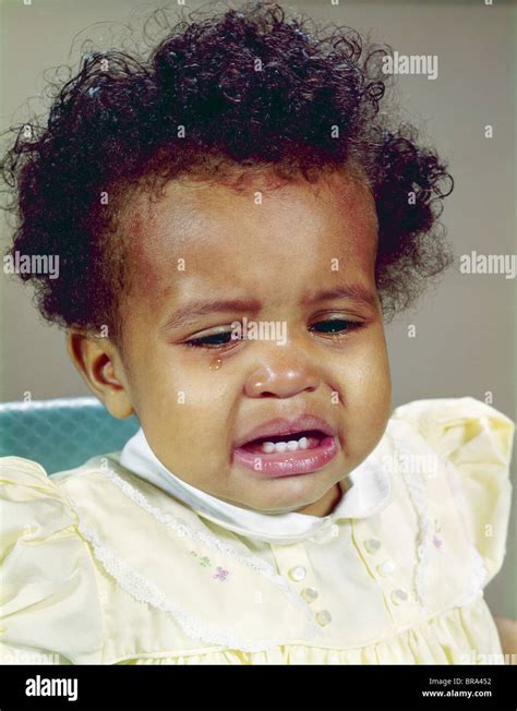 1960s African American Baby Girl Crying Stock Photo