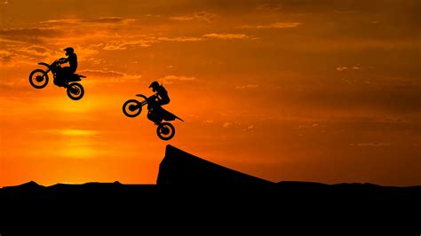 Stunt Bike Race Sunset Silhouette 5k Wallpapers Hd Wallpapers Id 27411