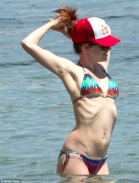Alyson Hannigan Reveals Sharp Rib Cage At Beach With Husband Alexis