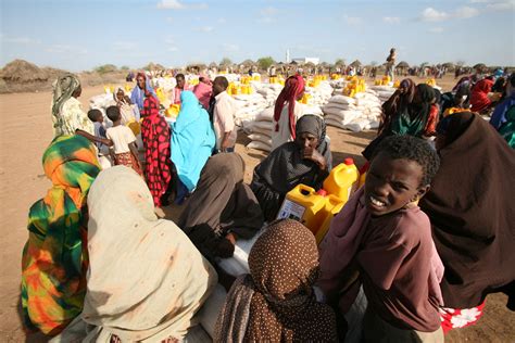 Displaced People Receiving Food Distributed By The Un World Food