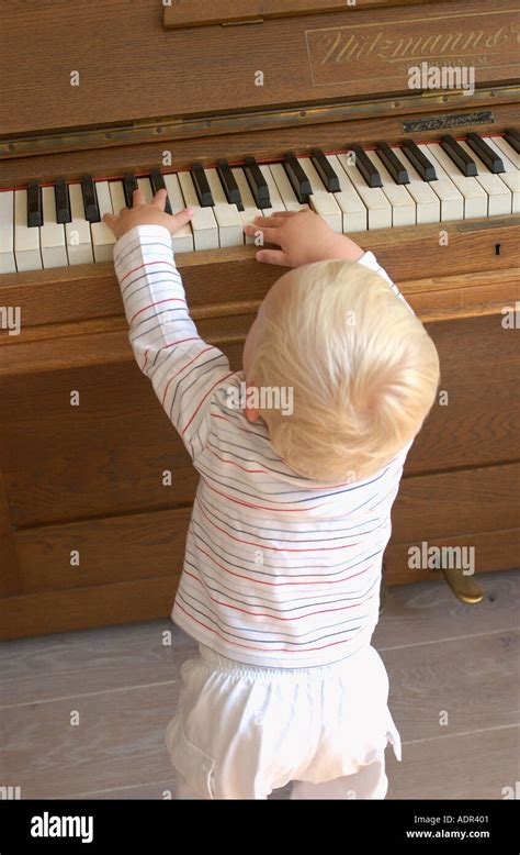 Child Playing Piano Stock Photo Alamy