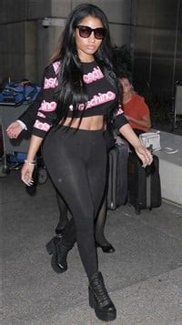 Nicki Minaj Smuggles Her Ass Out Of An Airport In See Thru Tights