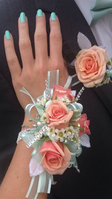 Beautiful Corsage And Matching Coral And Mint Boutonniere Prom
