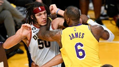 lebron james shoves forearm into aaron gordon s throat in altercation during lakers nuggets game