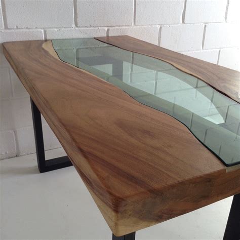 The coffee table is made using the technique resin art acacia table. 30 Best Acacia Top Dining Tables With Metal Legs