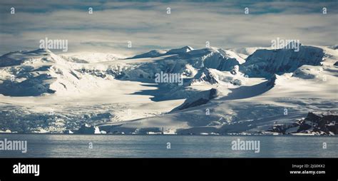 Antarctica Mountains And Sea Clouds And Blue Sky Stock Photo Alamy