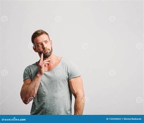 Handsome Man Thinking And Looking Up Stock Photo Image Of Adult Muscles