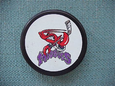 Red Rooster Hockey Pucks And Stuff