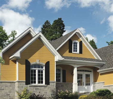 Blended roof combinations can come in a wide variety of choices, from shades of blue and grey to shades of brown and red and even different shades of green. Exterior paint colors with brown roof | Hawk Haven
