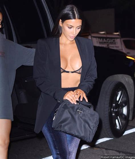 Kim Kardashian Flaunts Major Cleavage As She Wears Just A Sheer Bra And An Open Blazer