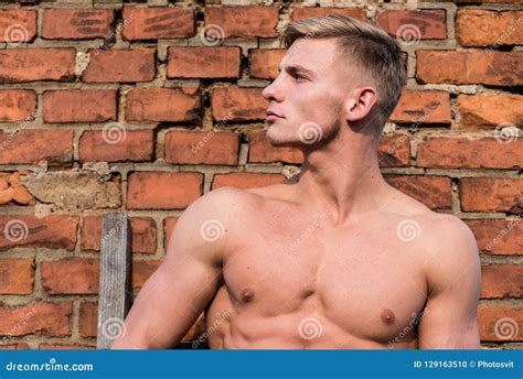 Man Muscular Chest Naked Torso Stand Brick Wall Background Attractive
