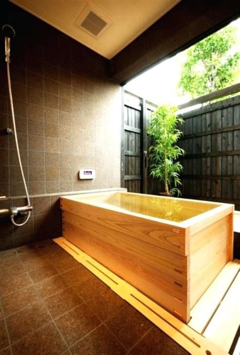 Custom built cedar cabinets with a linen closet adorned with twigs as door handles. japanese bathtub soaking bathtub with wooden ideas ...