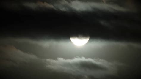 Dark Cloudy Night Sky With Full Moon Rise Timelapse Stock Video Footage