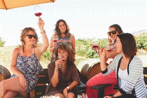 Five Friends Toasting With Wine By Stocksy Contributor Jayme Burrows