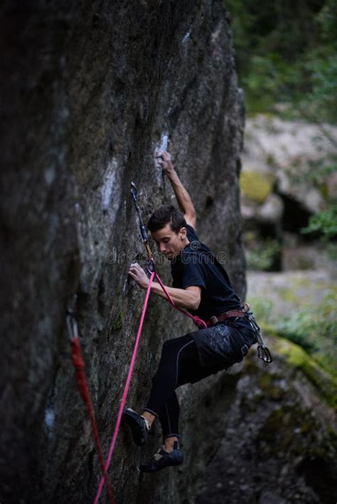 Extreme Sport Climbing Rock Climber Struggle For Success Stock Photo