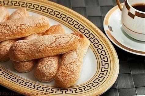 They a little crisp to bite in and soft and airy inside. Biscuit cookie «Savoyardi» or «lady fingers» is an ...