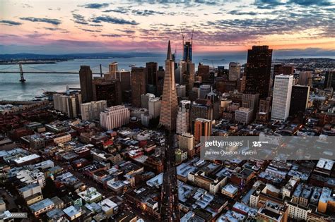 Aerial View Of Cityscape Against Cloudy Sky High Res Stock Photo