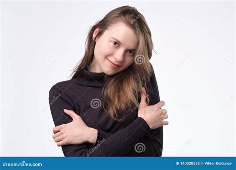 Cute European Girl Hugging Herself Standing On White Background Stock Image Image Of Concept