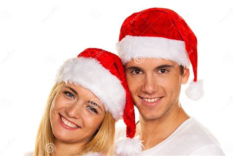 Couple At Christmas With Santa Claus Hats Stock Image Image Of