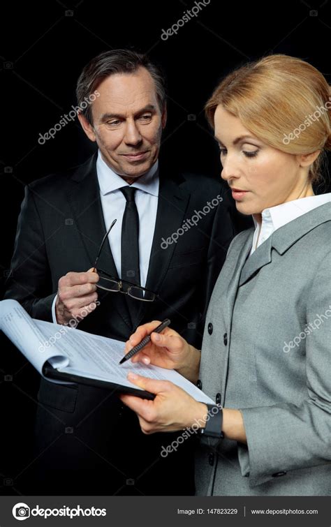 Businesspeople Signing Papers Stock Photo By ©yurasokolov 147823229