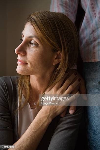 Comforting Hand Shoulder Photos And Premium High Res Pictures Getty