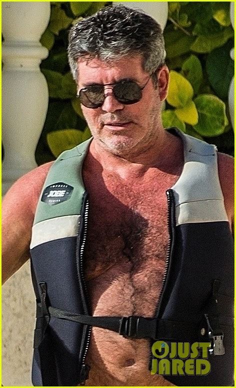 simon cowell and lauren silverman soak up the sun in barbados photo