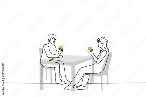 Man And Woman Sit At The Table Opposite Each Other And Drink Coffee To