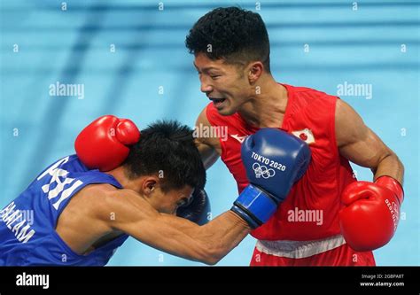 Japans Ryomei Tanaka Red And Philippines Carlo Paalam During The