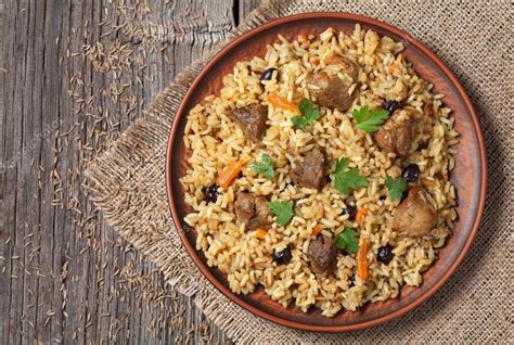 Arabic National Rice Food Called Pilaf Cooked With Fried Meat Onion