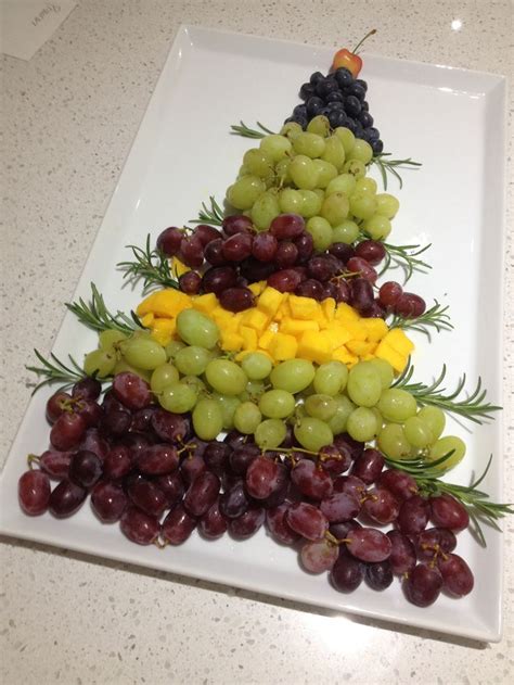 Rainbow fruit tray by rainbow birthday party. Christmas fruit platter | Fruit | Pinterest