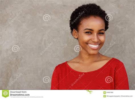 Attractive Young Black Woman In Red Shirt Smiling Stock Photo Image
