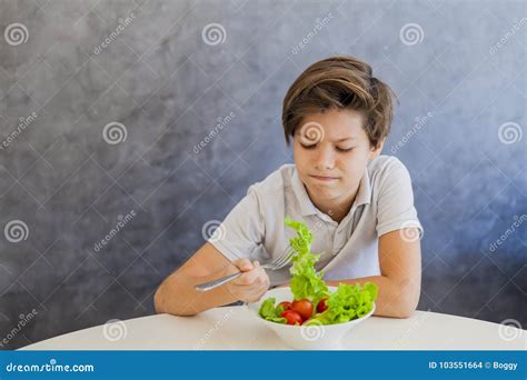 Cute Teen Boy Eating Salad Stock Photo Image Of Food 103551664