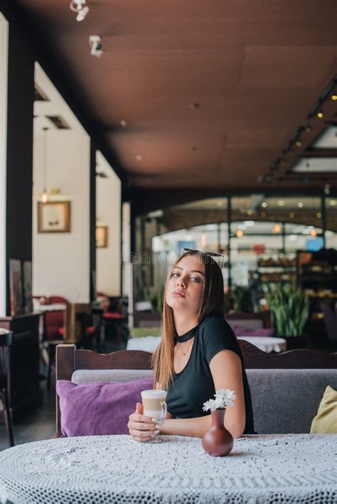 Woman Drinking Coffee In The Morning At Restaurant Soft Focus Pretty