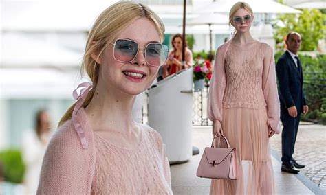 Elle Fanning Oozes Elegance In A Blush Hued Sheer Gown At Cannes Film