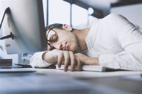 Lazy Office Worker Sleeping At His Desk Stock Photo Image Of Careless