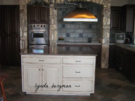 Slate gray painted alder cabinets mixed with those fashioned from distressed oak keep the kitchen piecy, as if renovated over time. LYNDA BERGMAN DECORATIVE ARTISAN: WHITE KITCHEN CABINETS ...