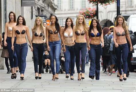 Here Come The Fembots Girls In Stick On Bras Take To The Streets Of