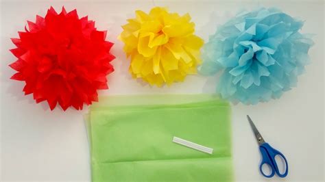 Learn how to make easy tissue paper flowers! How to Make Tissue Paper Pom Pom Flowers in 4 Easy Steps ...