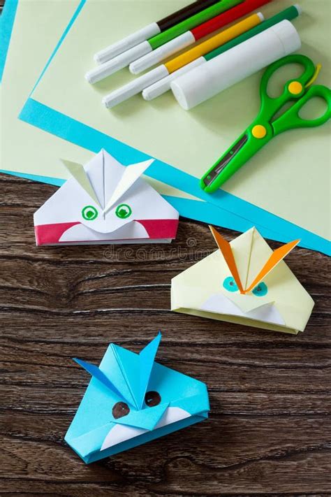 Origami Toy Angry Bird Glue Scissors And Paper On A Wooden Table