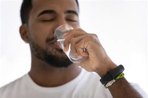 Young Biracial Man Drink Clean Mineral Water Stock Photo Image Of