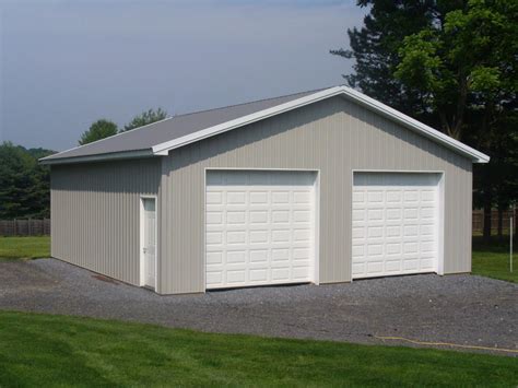 Unlike sliding doors, overhead doors seal well which is important for protecting your barn's interior. Two Car Garage | Lancaster Pole Buildings